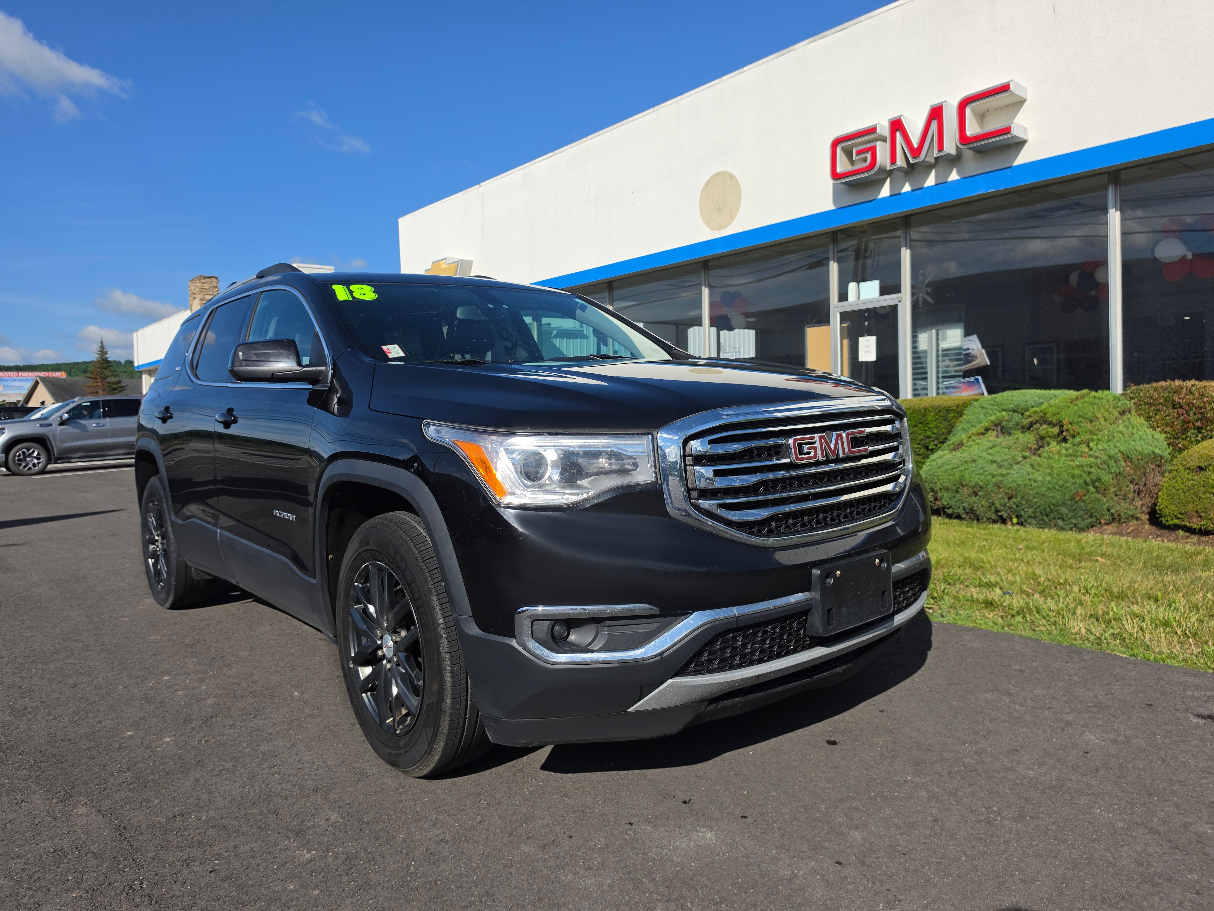2018 GMC Acadia SLT in Ebony Twilight Metallic — front three-quarter view