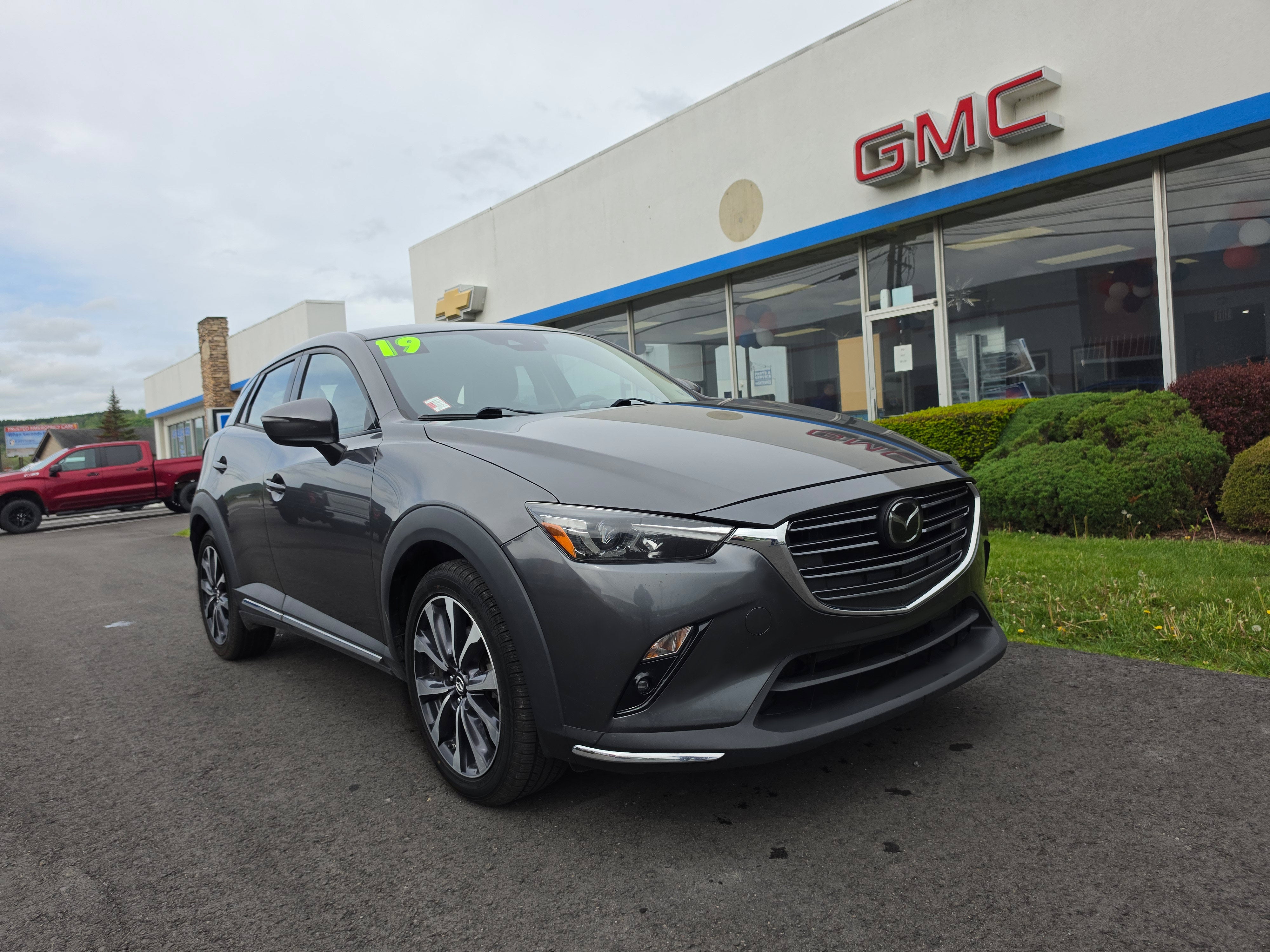 2019 Mazda Mazda CX-3 Grand Touring in Machine Gray Me — front three-quarter view