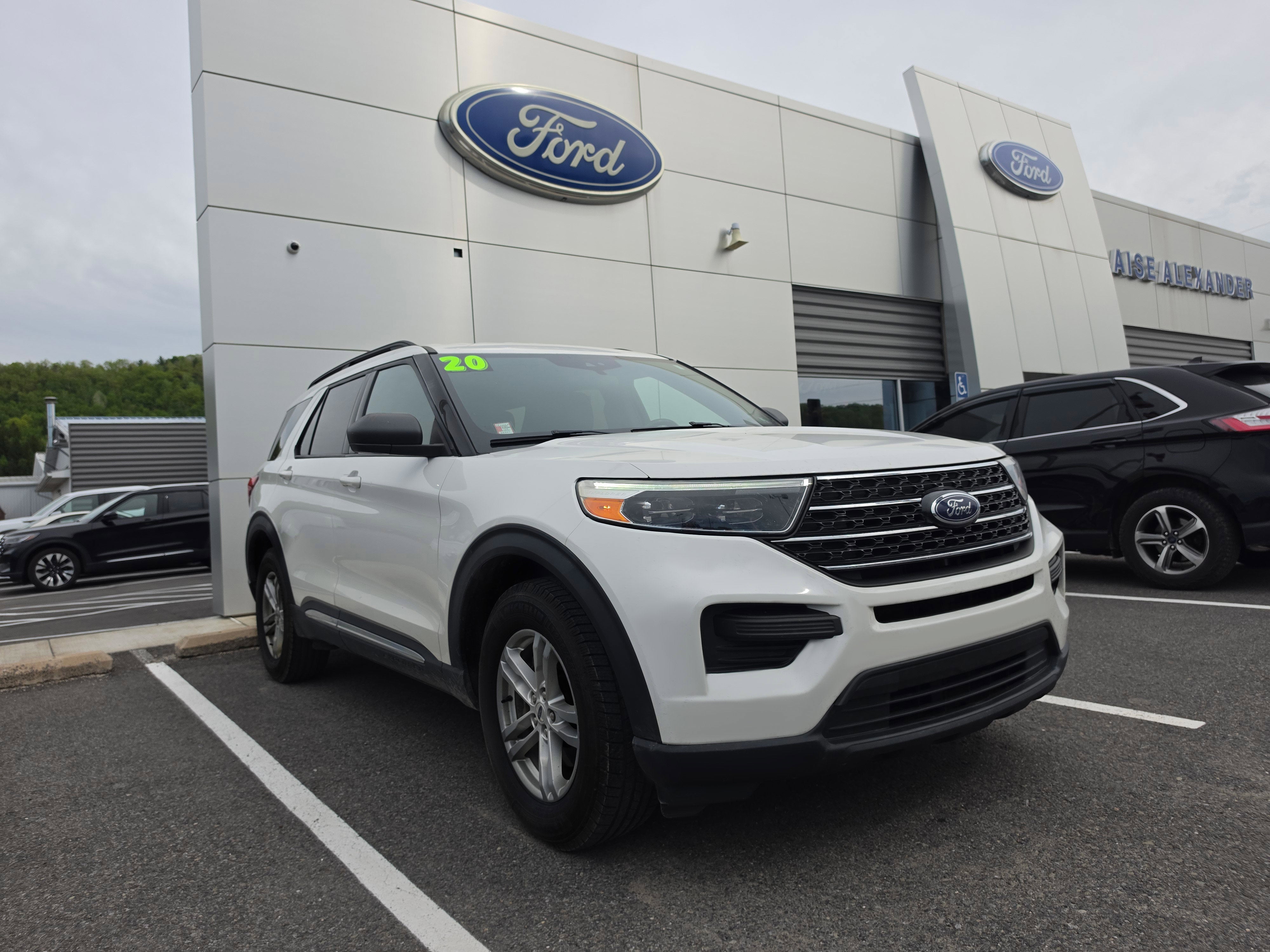 2020 Ford Explorer XLT in Star White Metallic Tri-Coat — front three-quarter view