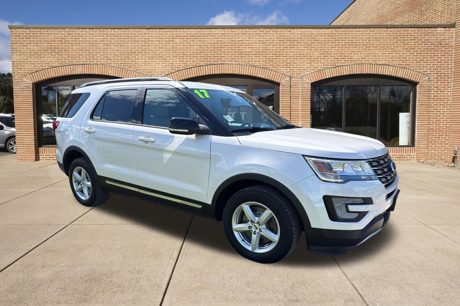 2017 Ford Explorer XLT in White Platinum Clearcoat Metallic — front three-quarter view